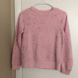 Pink sweater with golden stars